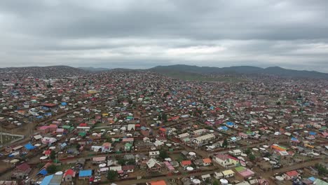 Aerial-drone-shot-of-poor-suburbs-in-mongolia-Ulan-Bator.-Endless-yurts-cloudy